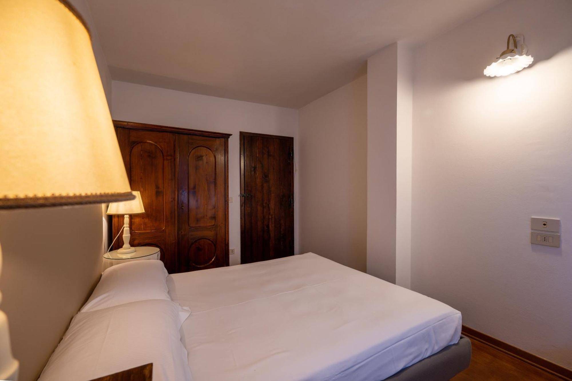 Hotel Palazzo Viviani Castello Di Montegridolfo Habitación foto