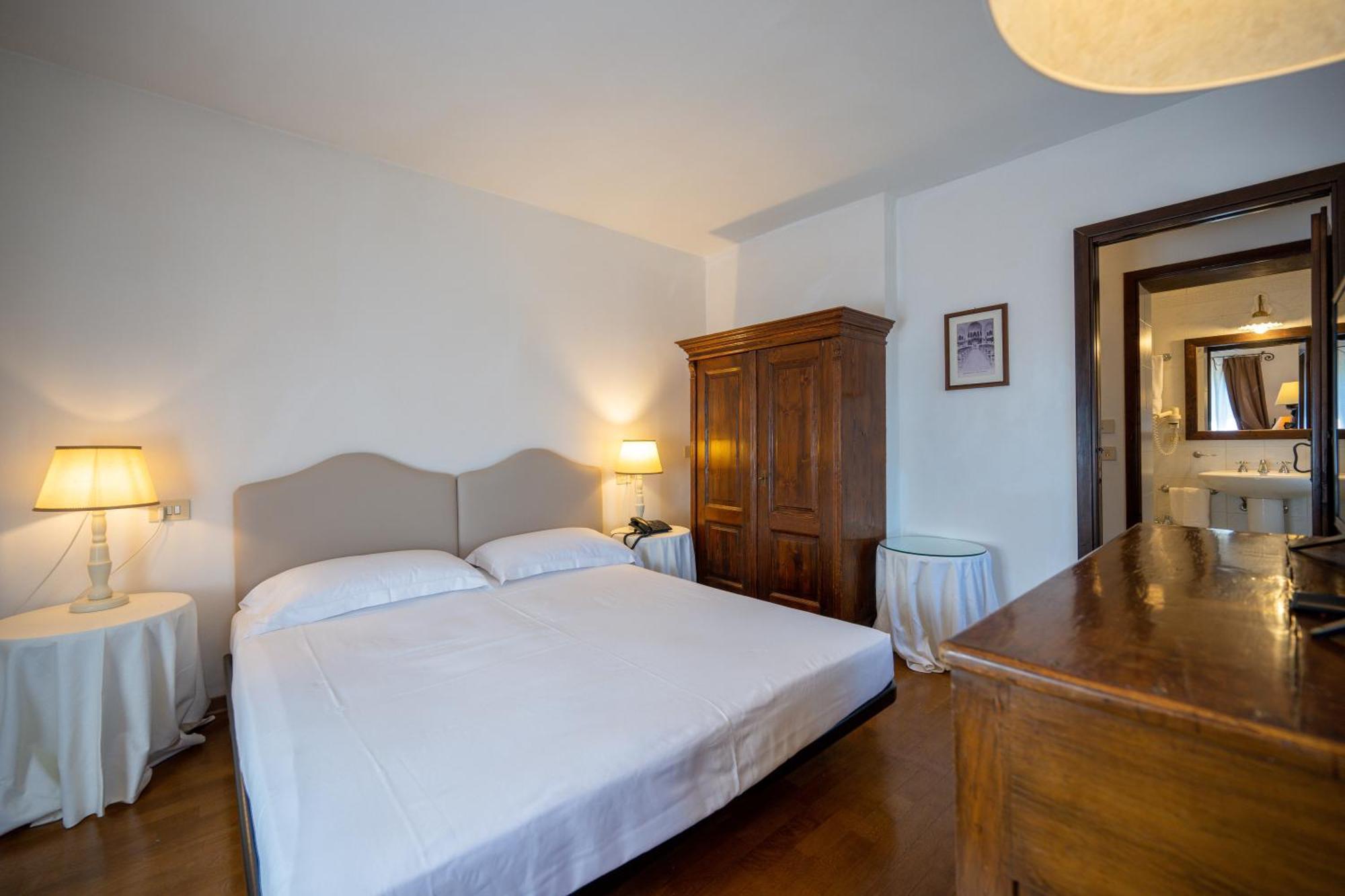 Hotel Palazzo Viviani Castello Di Montegridolfo Habitación foto